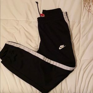 Black Nike joggers.